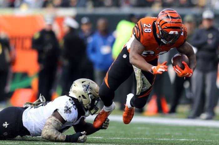 Nov 11, 2018; New Orleans Saints linebacker Demario Davis (56) tackles Cincinnati Bengals running back Joe Mixon (28). Mandatory Credit: Aaron Doster-USA TODAY Sports